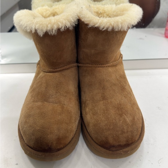 UGG Tan Boots with Cream Fur and Brown Bow - Picture 3 of 5